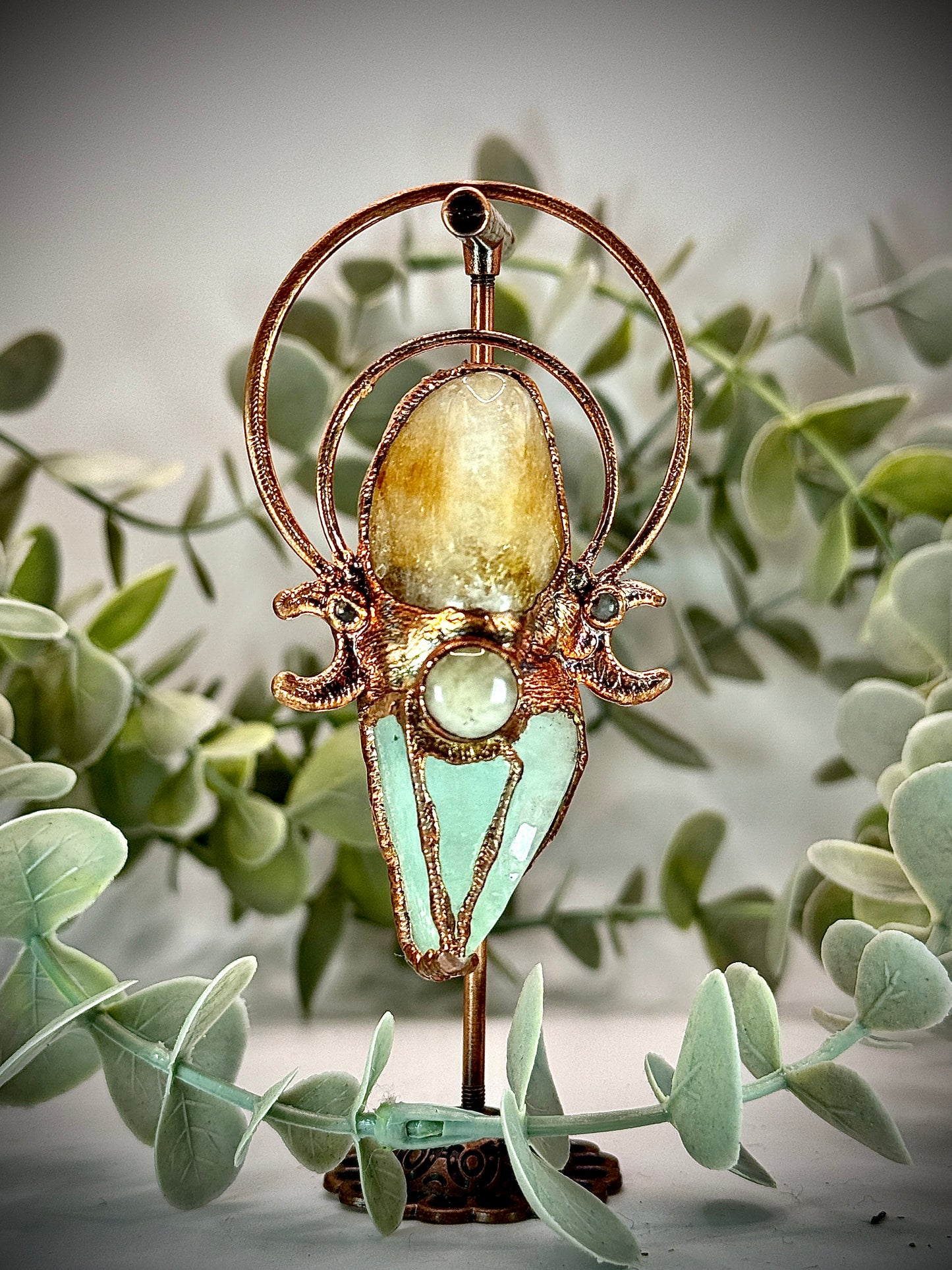 Crystal pendant featuring carnelian, green calcite, and yellow jade with copper moons – handmade boho jewellery