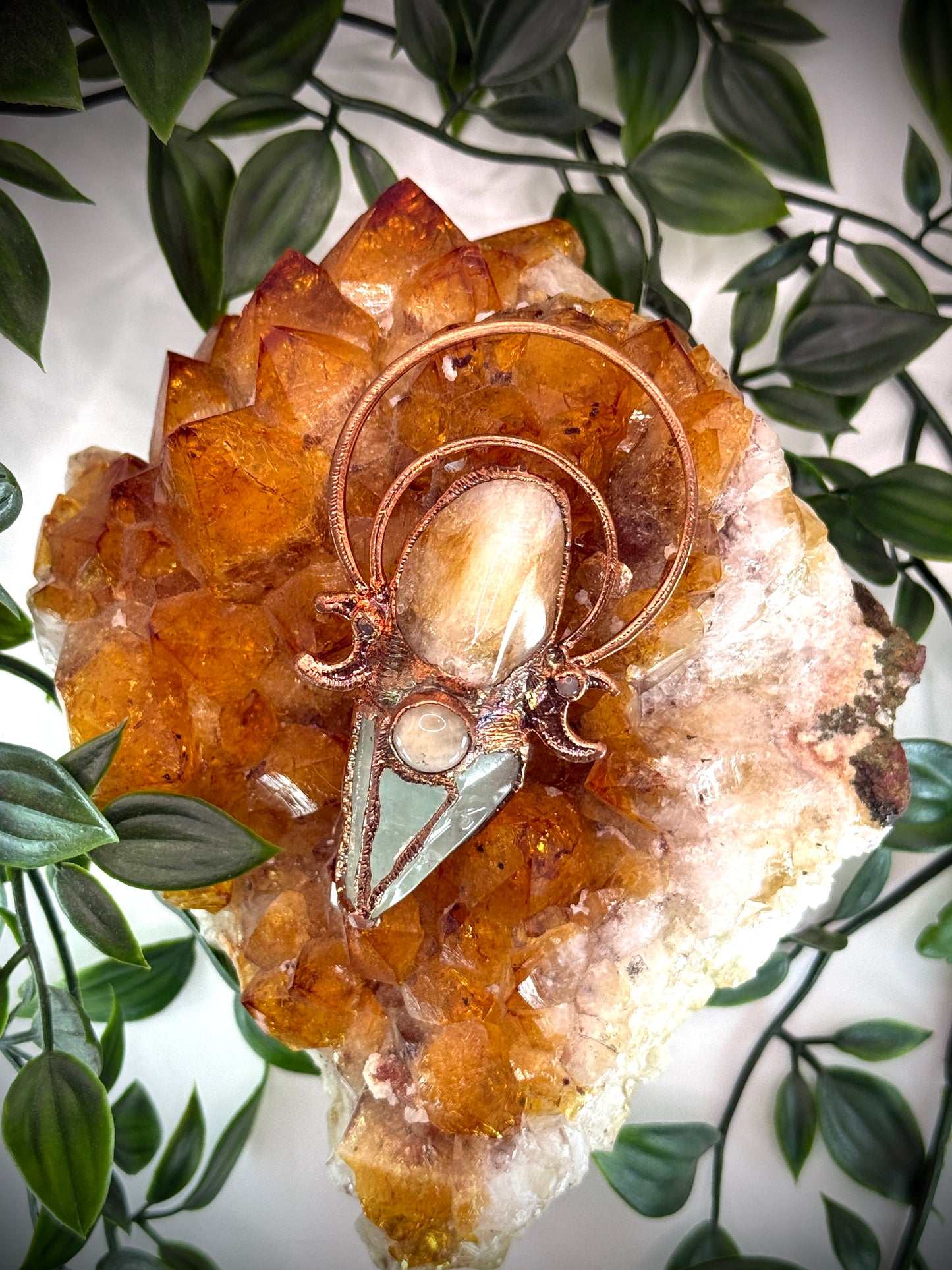 Crystal pendant featuring carnelian, green calcite, and yellow jade with copper moons – handmade boho jewellery