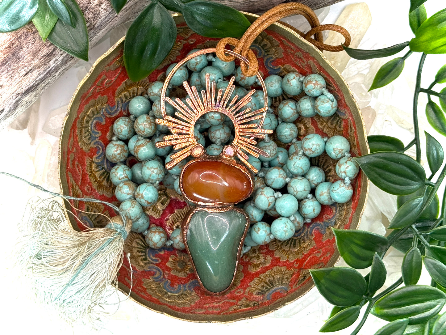 Handmade copper pendant with carnelian, green fluorite, moonstone accents, and sunburst detail – crystal jewellery for emotional balance and intuitive power.