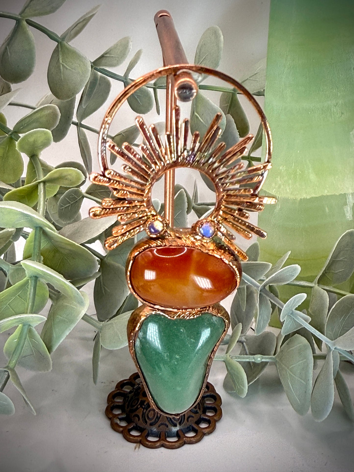 Handmade copper pendant with carnelian, green fluorite, moonstone accents, and sunburst detail – crystal jewellery for emotional balance and intuitive power.