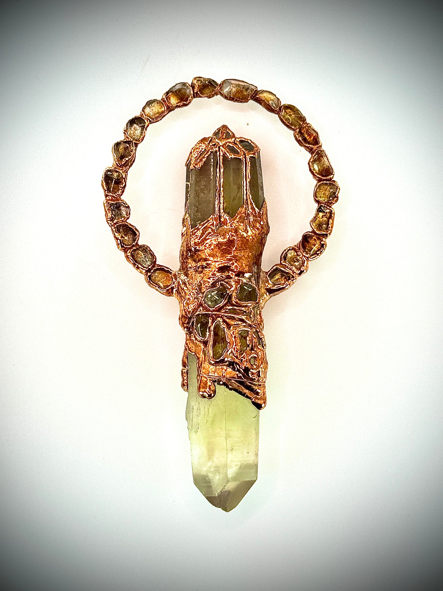 Handmade copper pendant featuring a citrine point, smoky quartz crown, and tumbled citrine accents – sunburst crystal jewellery for confidence and joy.