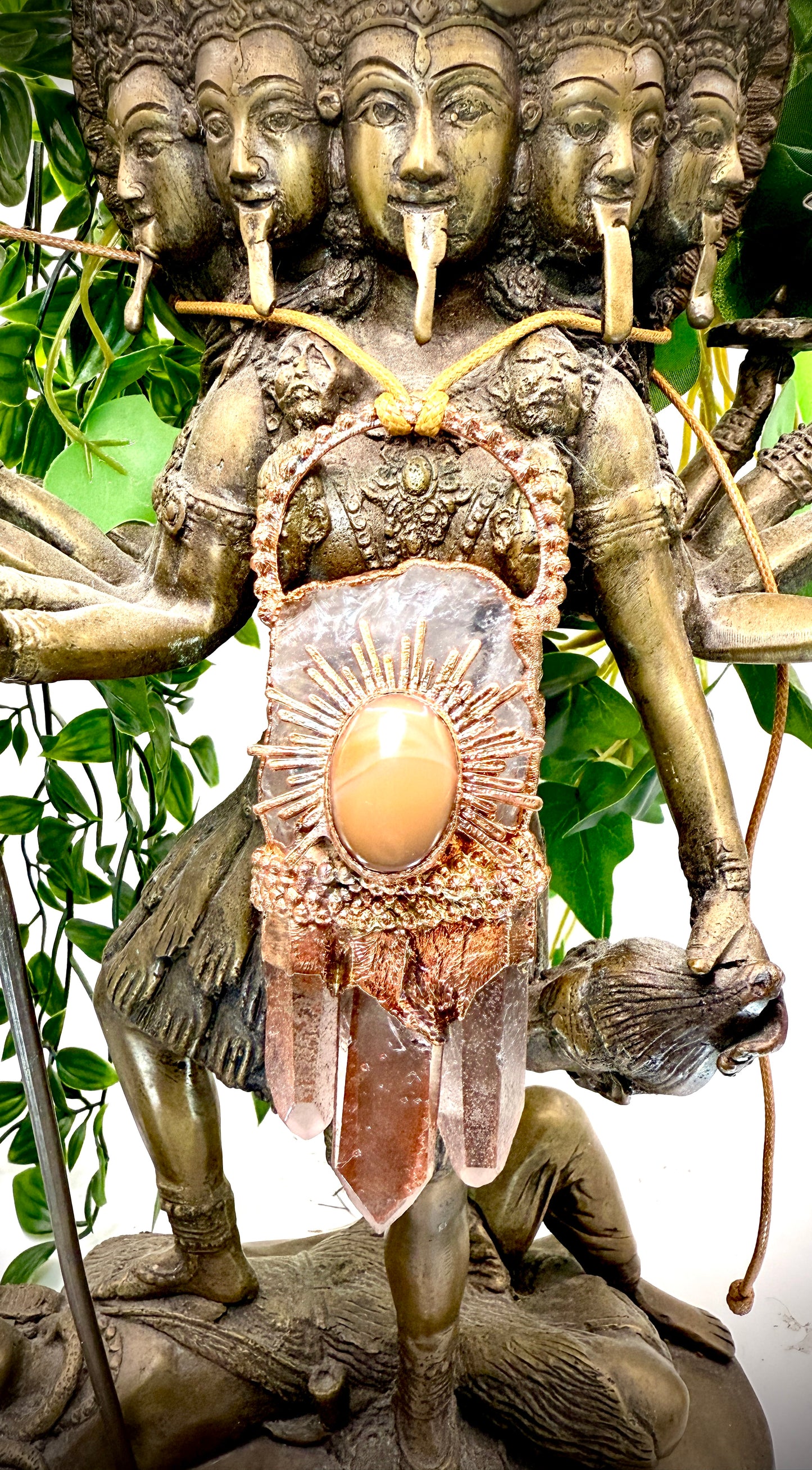 Handmade copper pendant with clear quartz crown, red lithium quartz points, carnelian cabochon, and sunburst accent – fiery crystal statement jewellery.