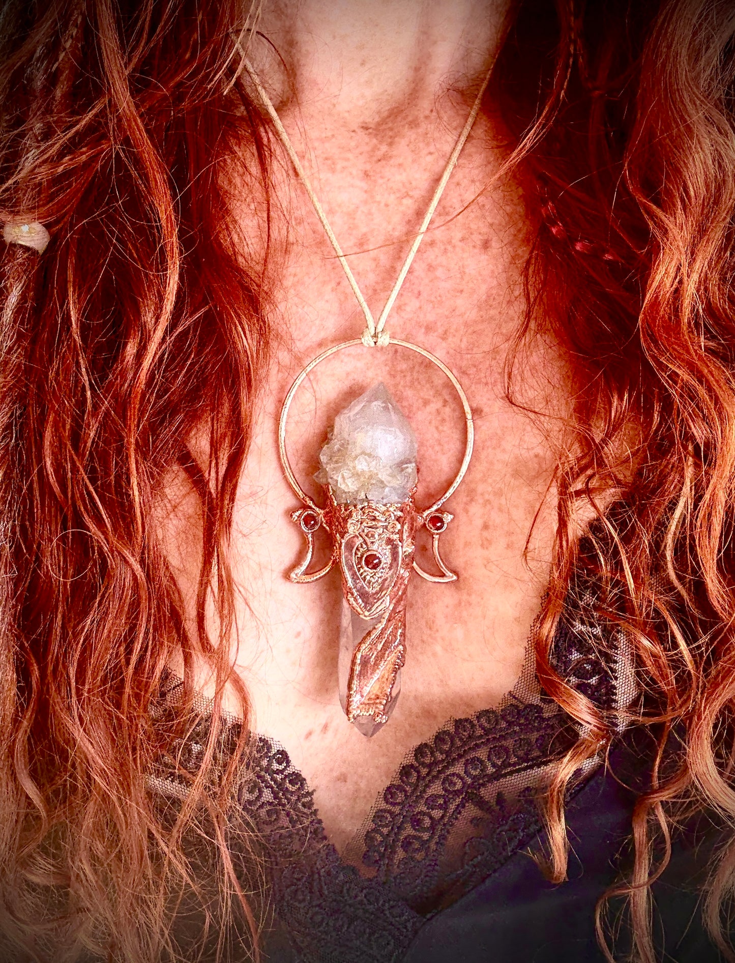 Goddess-inspired pendant with smoky quartz and clear quartz point bearing a crystal growth imprint – accented with copper and carnelian.