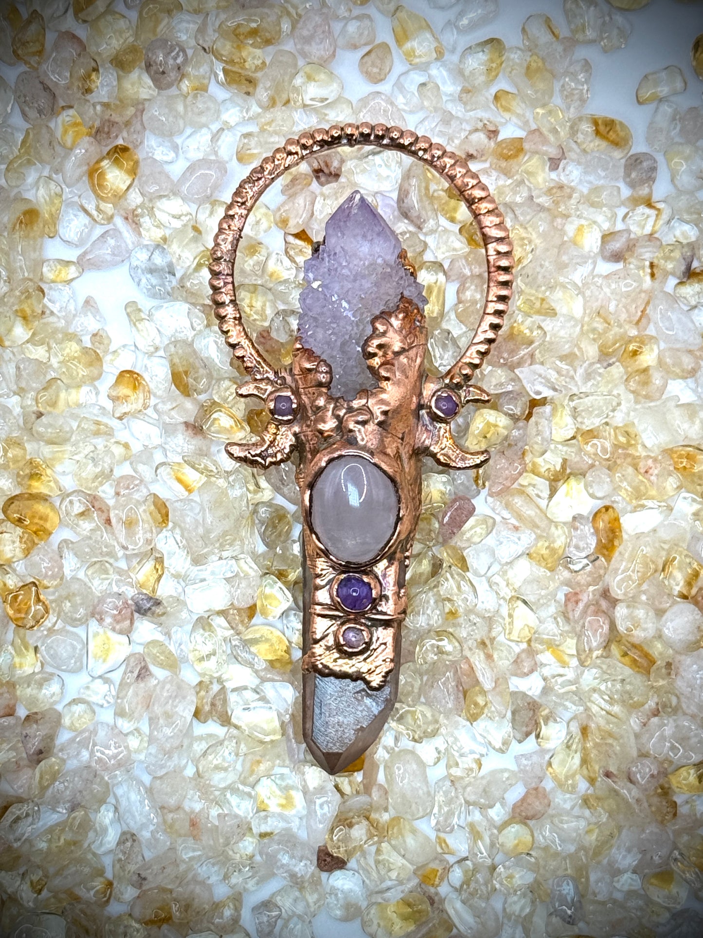Handmade copper pendant with spirit quartz, red lithium quartz, rose quartz, amethyst, and crescent moons – crystal jewellery for love and divine connection.