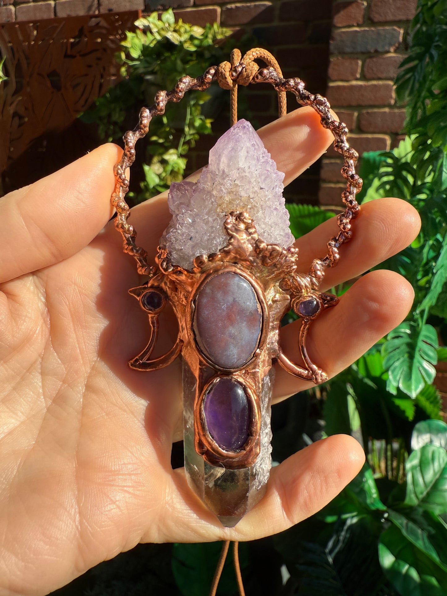 Handmade copper pendant with spirit quartz, tangerine quartz, Indian agate cabochon, amethyst accents, and crescent moons – celestial crystal jewellery.