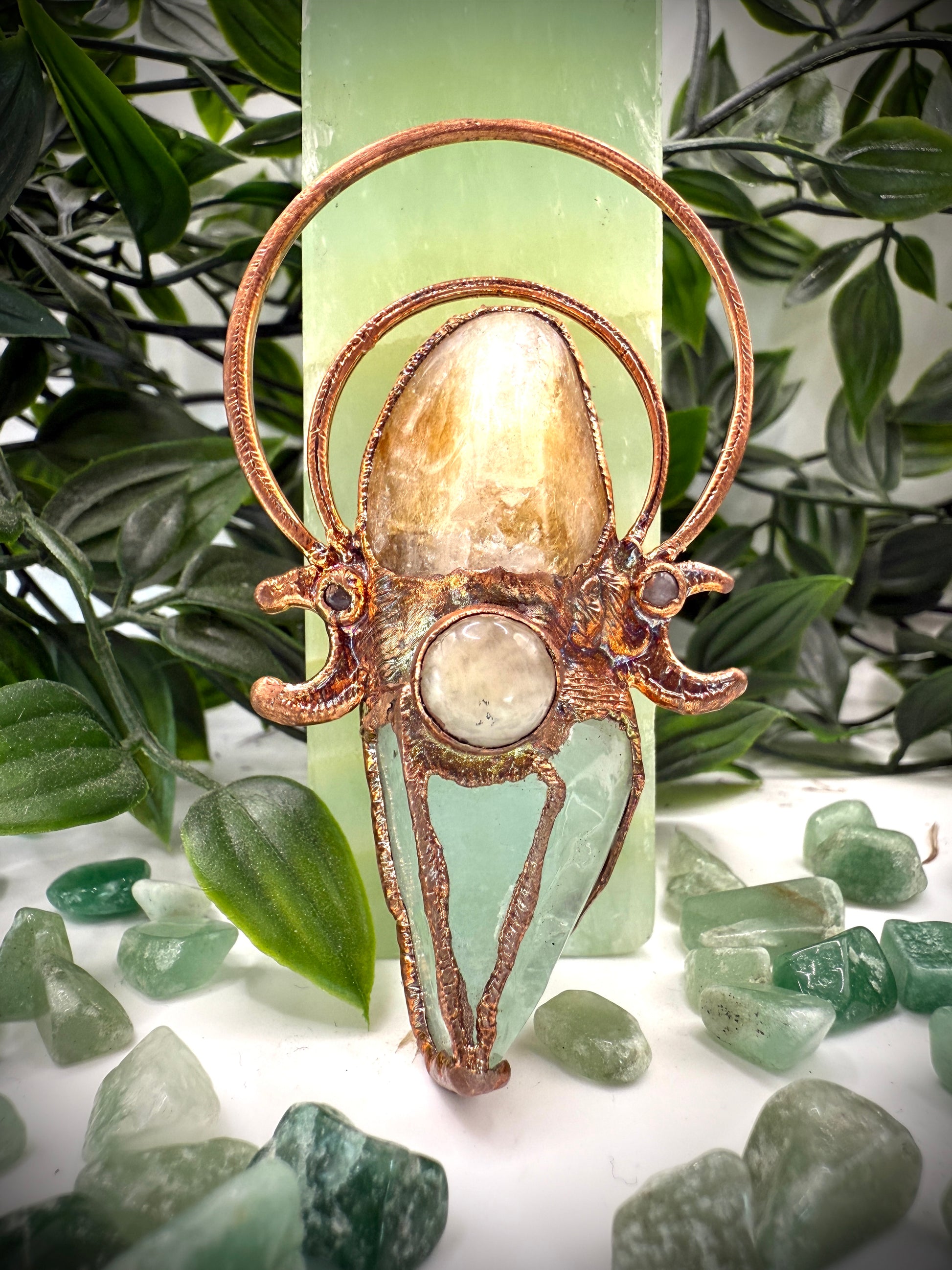 Crystal pendant featuring carnelian, green calcite, and yellow jade with copper moons – handmade boho jewellery