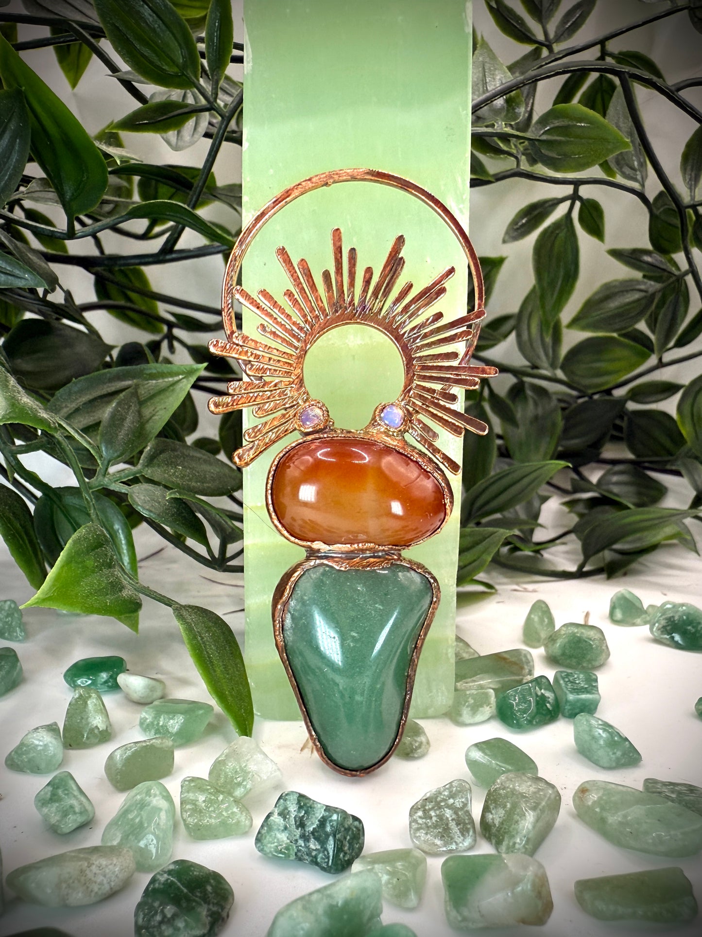 Handmade copper pendant with carnelian, green fluorite, moonstone accents, and sunburst detail – crystal jewellery for emotional balance and intuitive power.