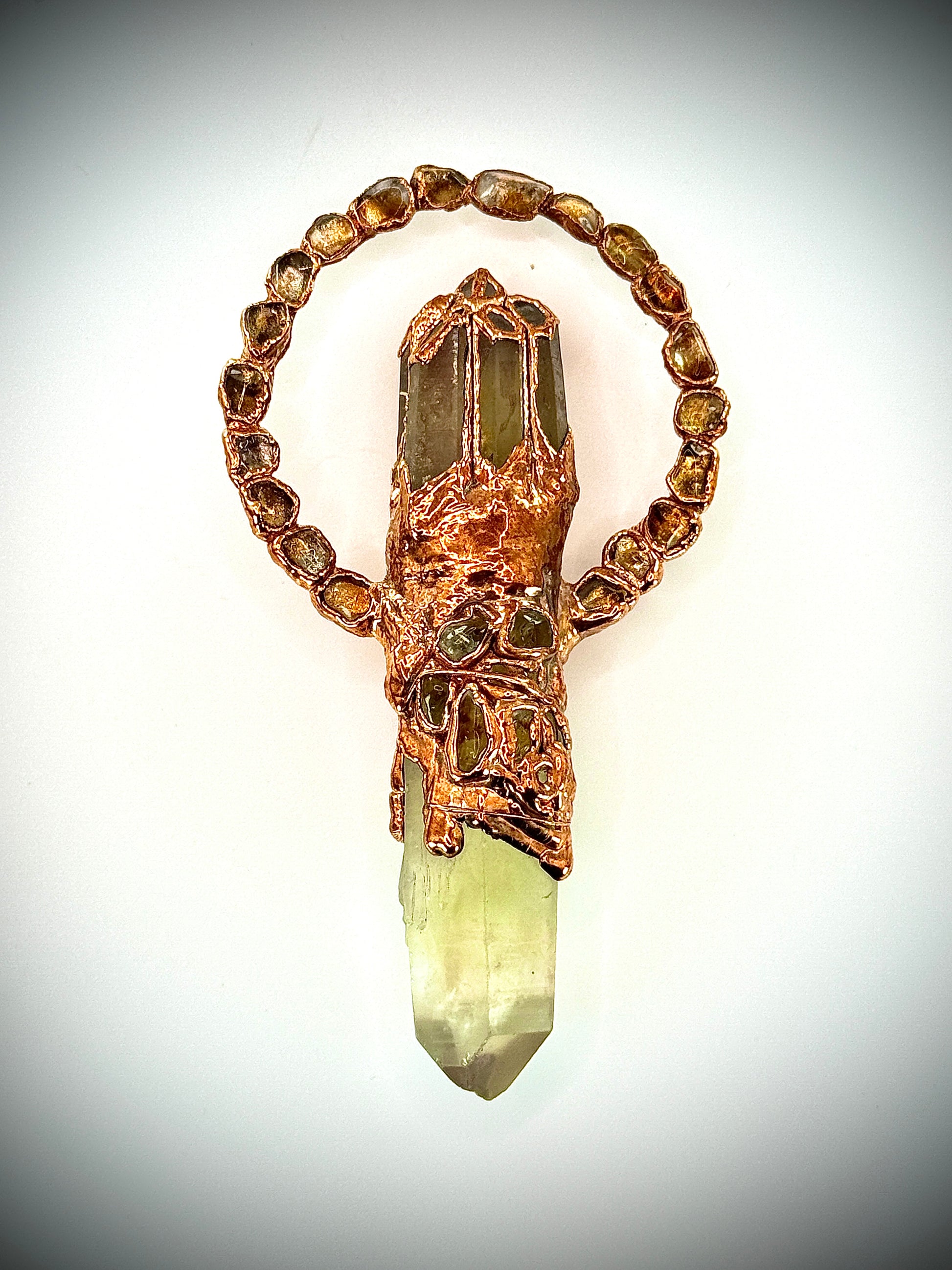 Handmade copper pendant featuring a citrine point, smoky quartz crown, and tumbled citrine accents – sunburst crystal jewellery for confidence and joy.