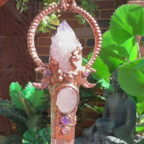 Handmade copper pendant with spirit quartz, red lithium quartz, rose quartz, amethyst, and crescent moons – crystal jewellery for love and divine connection.