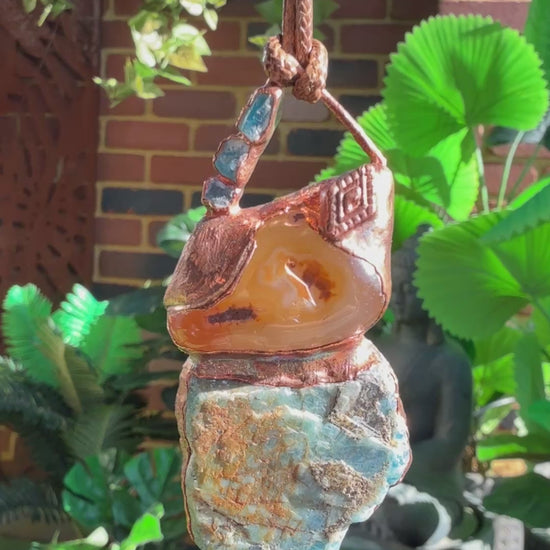 Handmade copper pendant with raw blue apatite, carnelian, and triangular top – funky crystal jewellery for creative expression and throat chakra alignment.