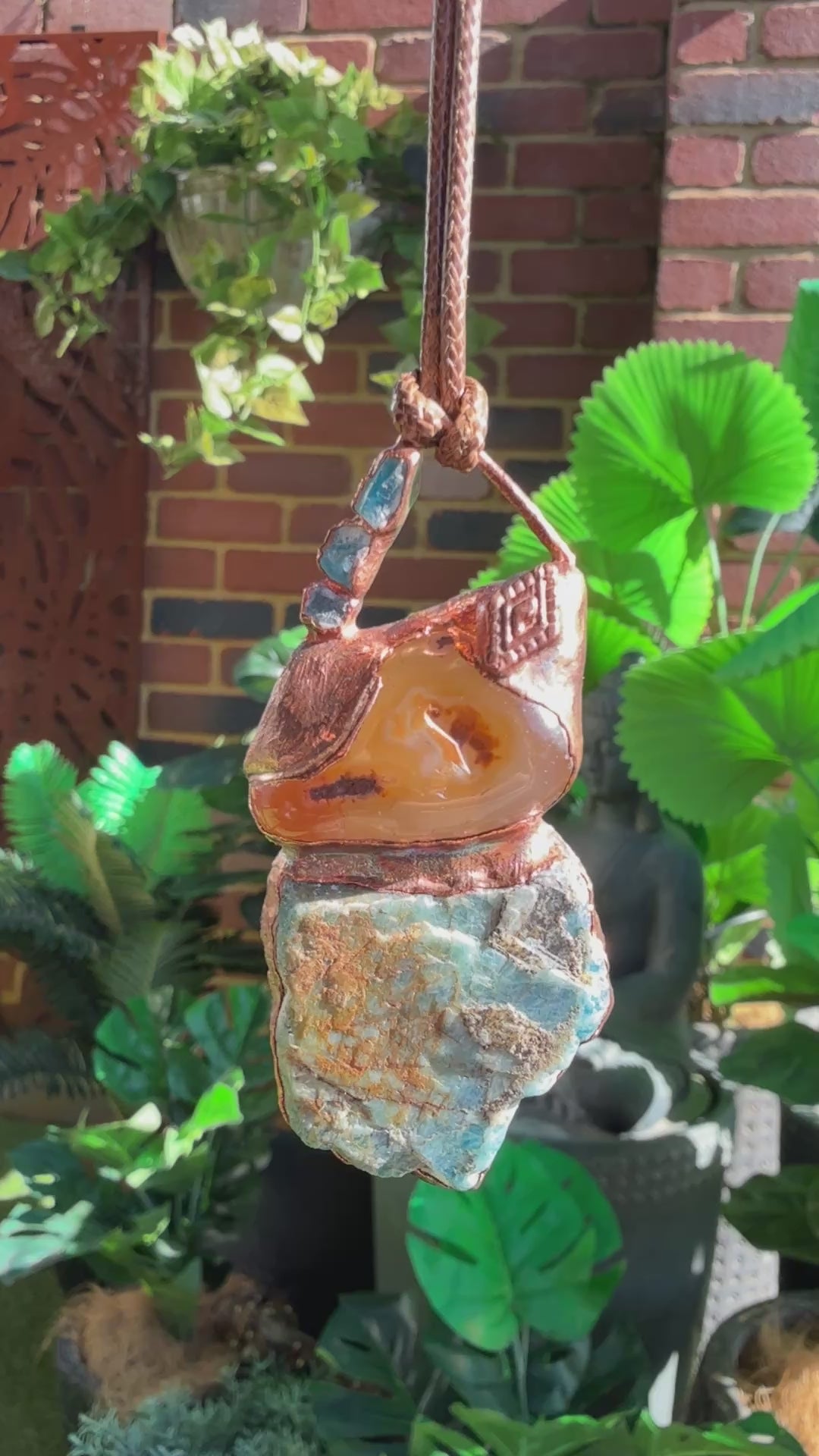 Handmade copper pendant with raw blue apatite, carnelian, and triangular top – funky crystal jewellery for creative expression and throat chakra alignment.