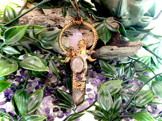 Handmade copper pendant with spirit quartz, red lithium quartz, rose quartz, amethyst, and crescent moons – crystal jewellery for love and divine connection.