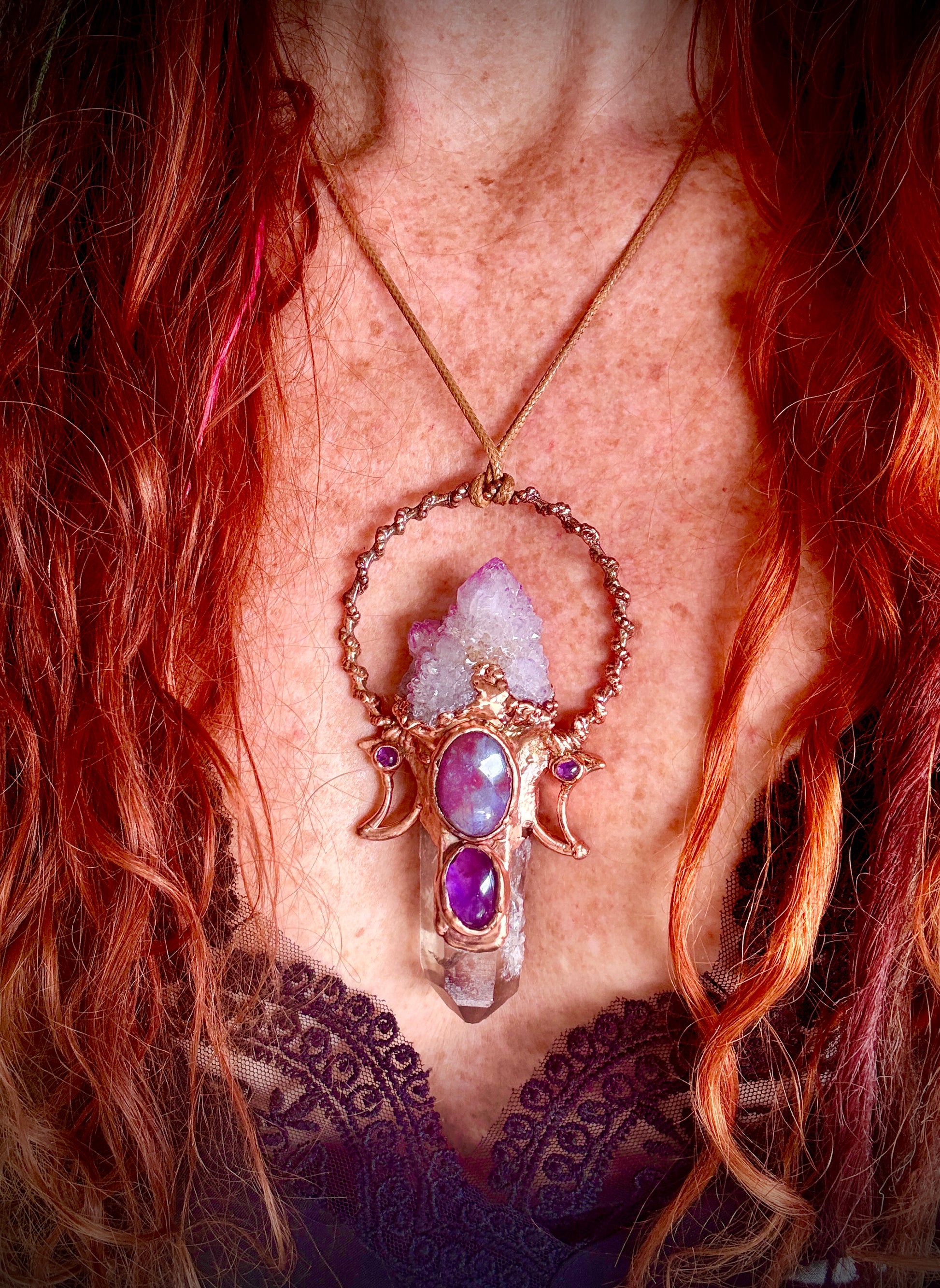 Copper pendant with raw spirit quartz, amethyst, and detailed crescent moon embellishments.